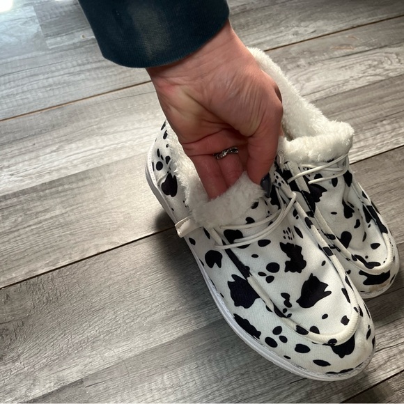 Hey Dude Shoes - Cow Print Sherpa insoles- Women’s Size 8 
Tagged for exposure.